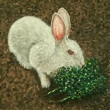 Rabbit eating kale for sale  Loxahatchee