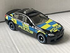 Usado, Neumáticos de goma para coche de policía BMW M5 2014 1/64 Matchbox segunda mano  Embacar hacia Argentina