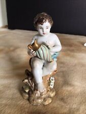 Lovely Vintage Ceramic Figurine Of Cherub Holding Vase Sitting On Tree Stump for sale  Shipping to South Africa