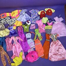 Lote de roupas da Barbie - Etiquetas rosa e roxas capitão adolescente comprar usado  Enviando para Brazil
