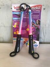 Juego que cambia de color Twister Rave Stickz - realiza 20 trucos de luz con instrucciones segunda mano  Embacar hacia Argentina