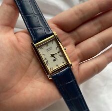 Reloj de pulsera Seiko delgado cuarzo cara blanca con batería banda azul japonés para hombre segunda mano  Embacar hacia Argentina