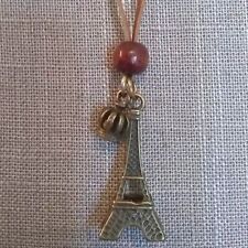 Collar Torre Eiffel con acento de corona y cuentas de madera sobre cordón marrón segunda mano  Embacar hacia Argentina