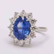 Anillo de flores de corte ovalado de 8,95 quilates zafiro azul de Ceilán con racimo de corte redondo de 3,65 quilates segunda mano  Embacar hacia Argentina