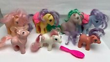 Lote de 7 My Little Ponies de colección Hasbro 4 grandes 3 pequeños sillín peine corazones 1982 84 segunda mano  Embacar hacia Argentina