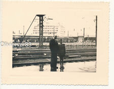 Photo vintage-man & child on dock station and electric locomotive d'occasion  Expédié en Belgium