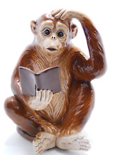 Monkey holding book for sale  Lapeer