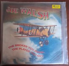 Disco de vinil JOE WALSH - O FUMANTE QUE VOCÊ BEBE O PLAYER VOCÊ RECEBE 12" LP. Muito bom estado comprar usado  Enviando para Brazil