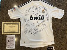 Camiseta deportiva firmada por el equipo Real Madrid temporada 2009/10; Cristiano Ronaldo + 22 más segunda mano  Embacar hacia Mexico