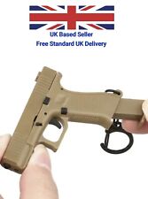 Chaveiro Glock 17 G17 arma 1:4 com peças móveis e carregador removível comprar usado  Enviando para Brazil