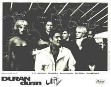 "Foto firmada de grupo ""Duran Duran"" 10X8 en caja y negro" segunda mano  Embacar hacia Argentina