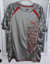 Camiseta deportiva de Puma tela de ajuste seco para jóvenes talla XL 12-14 unisex roja negra diseño apenas usada segunda mano  Embacar hacia Argentina