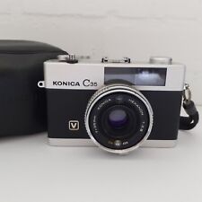 Kompaktowy aparat filmowy Konica C35 V 35mm, obiektyw Hexanon 38mm f/2.8, oryginalne etui na sprzedaż  Wysyłka do Poland