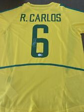Camiseta deportiva de fútbol de Roberto Carlos firmada por Brasil BAJO CERTIFICADO DE AUTENTICIDAD Real Madrid segunda mano  Embacar hacia Argentina