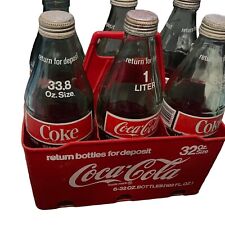 Paquete de 6 portadores de plástico vintage Coca Cola 32 OZ con 6 botellas de 1 litro/33,8 OZ segunda mano  Embacar hacia Argentina