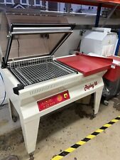 Shrink wrapping machine for sale  WHYTELEAFE