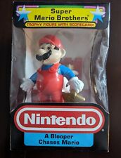 "Figura Nintendo Trophy - 1988 - Sellada de fábrica - "A Blooper Chases Mario" segunda mano  Embacar hacia Argentina