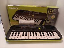 Mini teclado electrónico CASIO SA-46 negro y verde 32 teclas 100 tonos piano/órgano, usado segunda mano  Embacar hacia Argentina