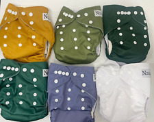 Usado, Lote de 7 fraldas e capas de pano reutilizáveis para bebês Nora's Nursey sólido criança comprar usado  Enviando para Brazil