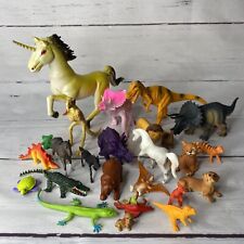 35 juguetes dinosaurios y varios animales perros león unicornio etc. Plástico grande/pequeño segunda mano  Embacar hacia Argentina
