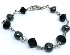 Black glass beads for sale  Palestine