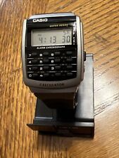 CASIO TOM PRATA, RESINA PRETA, CRONÓGRAFO DIGITAL, CALCULADORA, RELÓGIO ALARME CA-56-1CF comprar usado  Enviando para Brazil