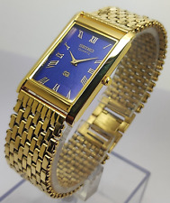Reloj de pulsera Seiko delgado cuarzo cara azul figura romana banda dorada hecha en japón para hombre segunda mano  Embacar hacia Argentina