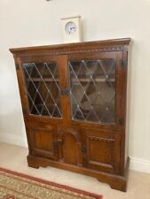Used, old charm small bookcase, solid oak, with glass doors to shelves and cupboard for sale  FERNDOWN