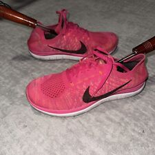 Zapatos para correr Nike Free 4.0 Flyknit para mujer talla 9 rosa negro naranja segunda mano  Embacar hacia Argentina
