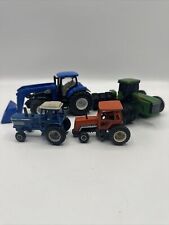 Usado, Lote de 4 tractores de juguete no como nuevos Ford, John Deere, New Holland y Deutz-Allis segunda mano  Embacar hacia Argentina