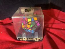 Rompecabezas vintage MegaMinx cubo de Tomy Rubik en estuche dodecaedro segunda mano  Embacar hacia Mexico