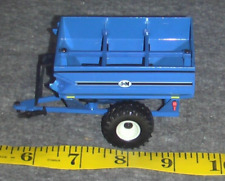 Vagão trator fundido Ertl 1/64 J&M azul Ford New Holland carrinho de grãos implemento comprar usado  Enviando para Brazil