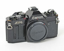 SLR czarna Canon AV-1 korpus aparatu analogowego 35mm nr 936789 na sprzedaż  PL