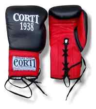 Guantes de boxeo Corti 16 oz cuero kick boxing rojo y negro con cordones segunda mano  Argentina 