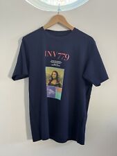 UNIQLO MUSEE DU LOUVRE X PETER SAVILLE MONA LISA NAVY T-SHIRT (MEDIUM) for sale  Shipping to South Africa