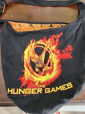 Mochila/trilogia capa dura/camisetas/pôster/bônus Hunger Games Fans District 12 comprar usado  Enviando para Brazil