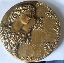 Médaille table calendrier d'occasion  La Chapelle-en-Serval