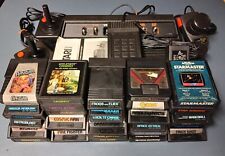 ¡Paquete de sistema Atari 2600 con consola, 30 juegos, joysticks, paletas y más!¡! segunda mano  Embacar hacia Argentina