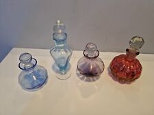 Four purfume bottles for sale  LIVERPOOL