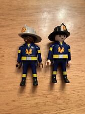 Dos figuras de bomberos de Playmobil Geobra uno afroamericano segunda mano  Embacar hacia Argentina