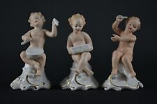 Três Wallendorf estatuetas alemãs cupidos putti angels maestro baterista acordeão comprar usado  Enviando para Brazil