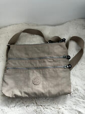 Bolso bandolera de nailon Kipling multibolsillo mediano beige excelente segunda mano  Embacar hacia Mexico