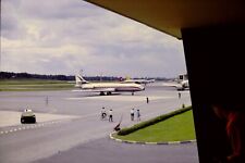 Busy Singapore ramp with Invicta C-54 a long way from home!  Mar-70 orig slide for sale  Shipping to South Africa