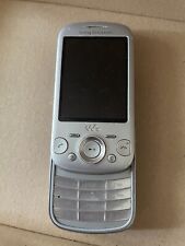 Srebrny telefon komórkowy Sony Ericsson Zylo W20i suwak - (pomarańczowy) części zamienne/naprawy na sprzedaż  Wysyłka do Poland