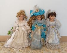 Tre bambole porcellana usato  Quarrata