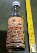 BOTELLA DE LICOR VACÍA EN MINIATURA DE WHISKY ESCOCÉS DEWAR'S ETIQUETA BLANCA  segunda mano  Embacar hacia Argentina