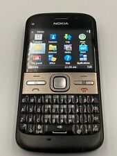 Teléfono móvil con botones de tres redes Nokia E5-00 negro/plateado segunda mano  Embacar hacia Argentina