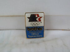 Pin patrocinador de los Juegos Olímpicos de verano 1984 - máquinas de escribir Brother - pasador con incrustaciones  segunda mano  Embacar hacia Argentina