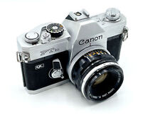 Câmera SLR Cromada Canon FTb-QL 35mm com Lente 50mm f/1.8 FL - Muito Boa comprar usado  Enviando para Brazil