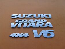 SUZUKI GRAND VITARA V6 4X4 EMBLEMA TRASEIRO CROMADO LOGOTIPO EMBLEMA SINAL SÍMBOLO USADO A39018 comprar usado  Enviando para Brazil